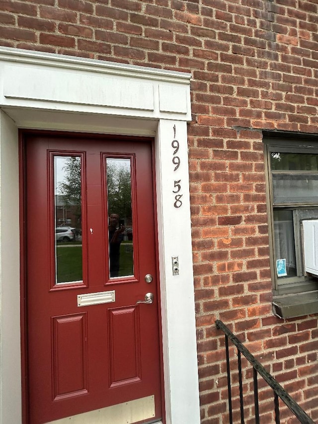 199-58 21st Ave Unit 1-165, Whitestone, NY 11357 - entrance to property with brick siding