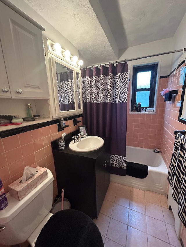 199-58 21st Ave Unit 1-165, Whitestone, NY 11357 - full bathroom featuring toilet, tile patterned flooring, vanity, shower / tub combo, and tile walls