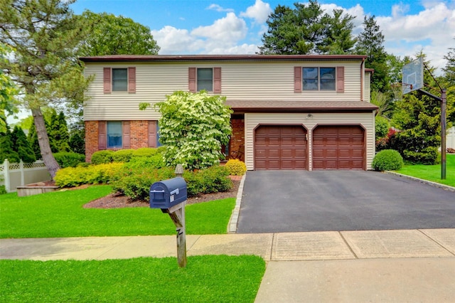 77 Barry Ln, Syosset, NY 11791 - view of front of home featuring an attached garage, asphalt driveway, a front lawn, and brick siding