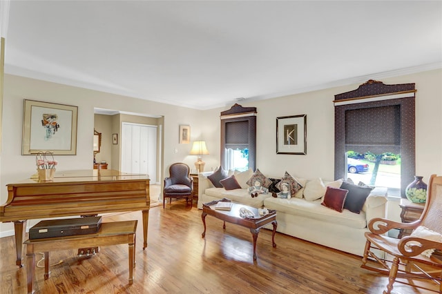 77 Barry Ln, Syosset, NY 11791 - living area with healthy amount of natural light, wood finished floors, and crown molding