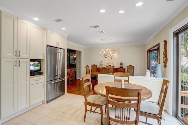77 Barry Ln, Syosset, NY 11791 - dining space with a chandelier, crown molding, recessed lighting, and light tile patterned flooring
