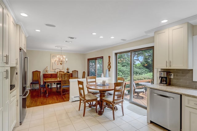 77 Barry Ln, Syosset, NY 11791 - dining area featuring a chandelier, recessed lighting, ornamental molding, and a baseboard heating unit