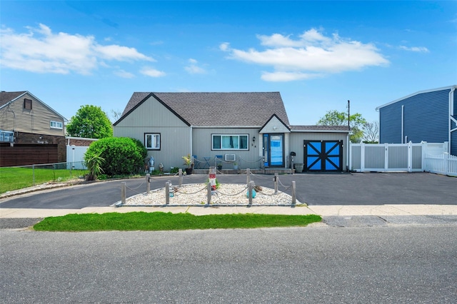 24 Raynor St, West Babylon, NY 11704 - view of front of home featuring roof with shingles