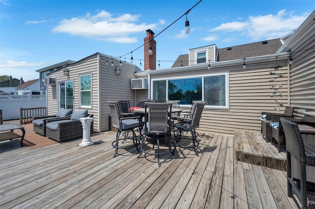 24 Raynor St, West Babylon, NY 11704 - deck featuring outdoor dining area and an outdoor hangout area