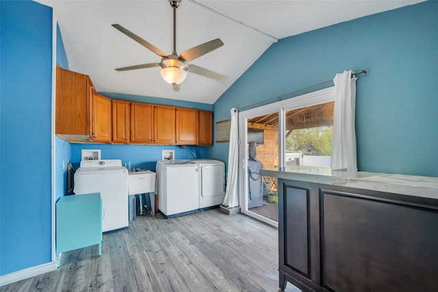 24 Raynor St, West Babylon, NY 11704 - laundry room featuring cabinet space, independent washer and dryer, light wood-style floors, and ceiling fan