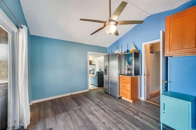 24 Raynor St, West Babylon, NY 11704 - kitchen with lofted ceiling, ceiling fan, dark wood finished floors, and baseboards