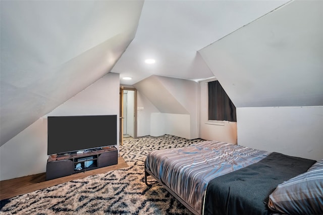 24 Raynor St, West Babylon, NY 11704 - bedroom featuring vaulted ceiling and wood finished floors
