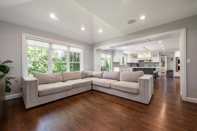14 Pond Park Rd, Great Neck, NY 11023 - living area featuring dark wood-style floors, recessed lighting, baseboards, and vaulted ceiling