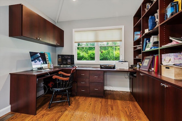 14 Pond Park Rd, Great Neck, NY 11023 - office featuring wood finished floors, built in study area, and baseboards