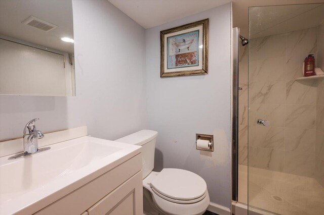 14 Pond Park Rd, Great Neck, NY 11023 - full bathroom featuring vanity, a stall shower, toilet, and baseboards