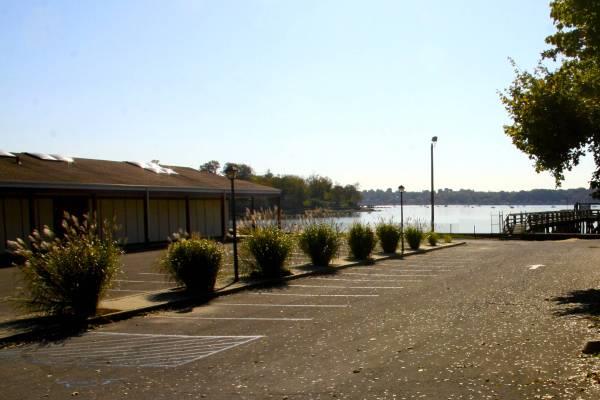 14 Pond Park Rd, Great Neck, NY 11023 - view of car parking with a water view