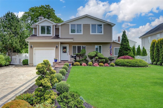 224 Biltmore Blvd, Massapequa, NY 11758 - view of front of property with a garage, decorative driveway, and a chimney