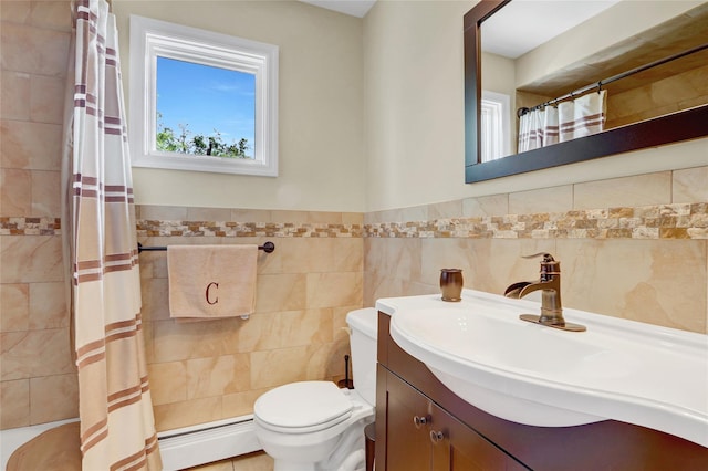 224 Biltmore Blvd, Massapequa, NY 11758 - full bath with tile walls, toilet, a baseboard radiator, vanity, and a shower with curtain