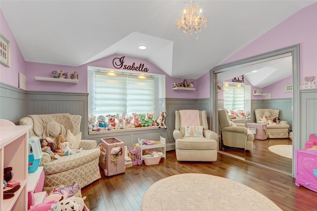 224 Biltmore Blvd, Massapequa, NY 11758 - bedroom featuring lofted ceiling, hardwood / wood-style flooring, wainscoting, and a chandelier