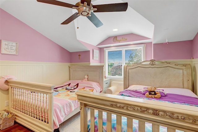 224 Biltmore Blvd, Massapequa, NY 11758 - bedroom featuring lofted ceiling, a wainscoted wall, and ceiling fan