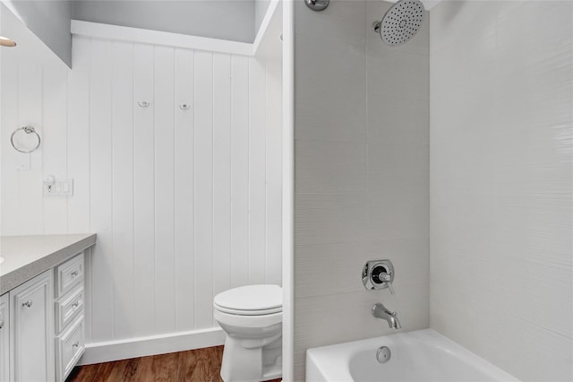 224 Biltmore Blvd, Massapequa, NY 11758 - bathroom featuring toilet, vanity, tub / shower combination, wood finished floors, and baseboards