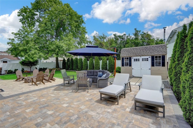 224 Biltmore Blvd, Massapequa, NY 11758 - view of patio with an outdoor living space with a fire pit and an outdoor structure