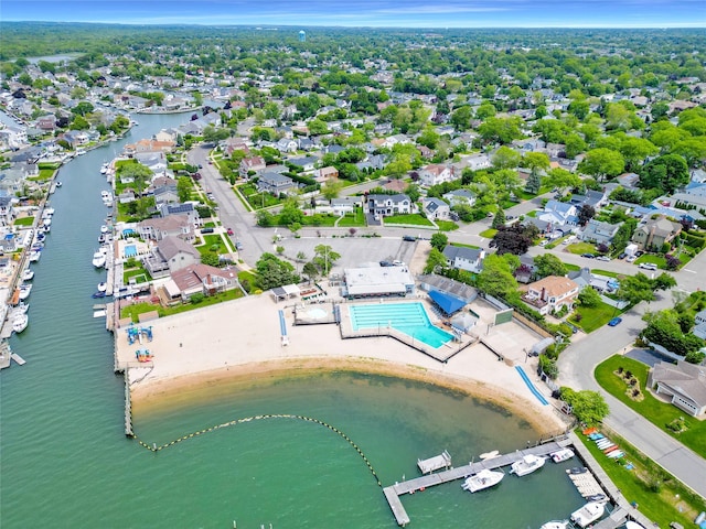 224 Biltmore Blvd, Massapequa, NY 11758 - drone / aerial view of a large body of water and a pool area