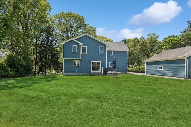 206 Brooksite Dr, Smithtown, NY 11787 - rear view of property featuring a yard and a chimney