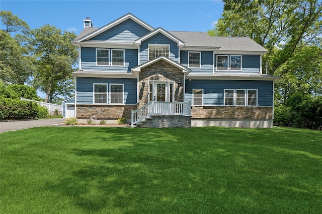 206 Brooksite Dr, Smithtown, NY 11787 - craftsman inspired home with stone siding, a chimney, and a front yard