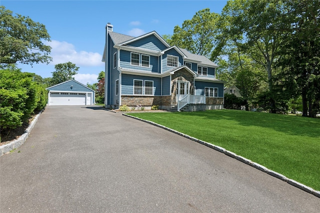 206 Brooksite Dr, Smithtown, NY 11787 - view of front of house featuring an outdoor structure, a garage, a chimney, a front lawn, and stone siding