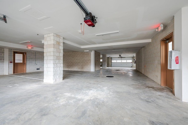661 W Broadway Unit 203, Long Beach, NY 11561 - garage with a garage door opener