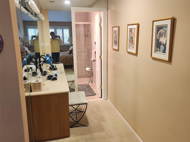 166 Southgate Cir, Massapequa Park, NY 11762 - bathroom featuring vanity, connected bathroom, a shower, and baseboards