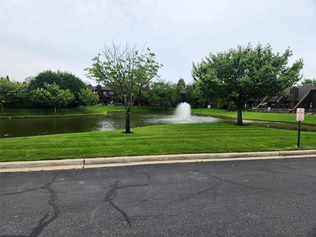 166 Southgate Cir, Massapequa Park, NY 11762 - exterior space with a water view and a lawn