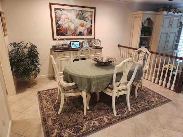 166 Southgate Cir, Massapequa Park, NY 11762 - dining area with light tile patterned flooring and baseboards