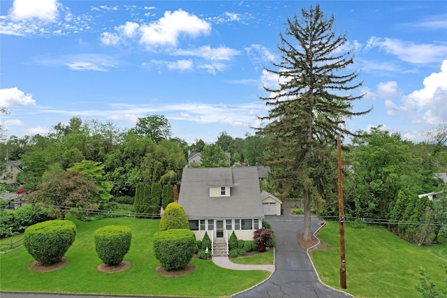 26 Van Nostrand Pl, Nanuet, NY 10954 - view of front of home with a front lawn and a garage