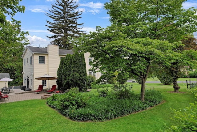 26 Van Nostrand Pl, Nanuet, NY 10954 - view of grassy yard featuring a patio area