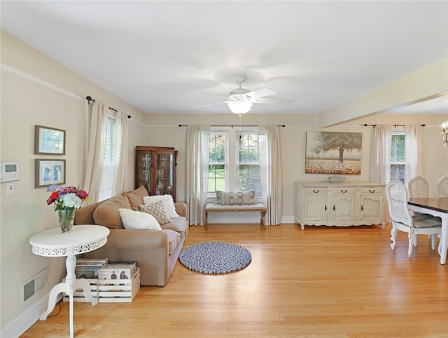 26 Van Nostrand Pl, Nanuet, NY 10954 - living room featuring plenty of natural light, a ceiling fan, light wood-type flooring, and baseboards