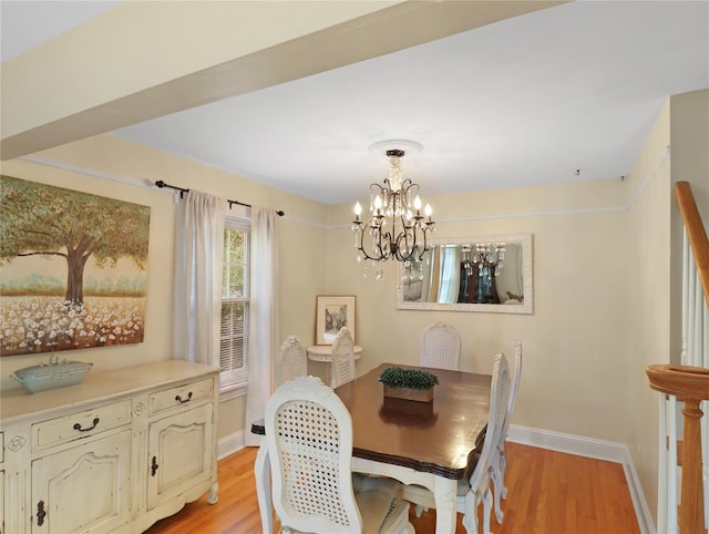 26 Van Nostrand Pl, Nanuet, NY 10954 - dining room featuring light wood-type flooring, baseboards, and a chandelier