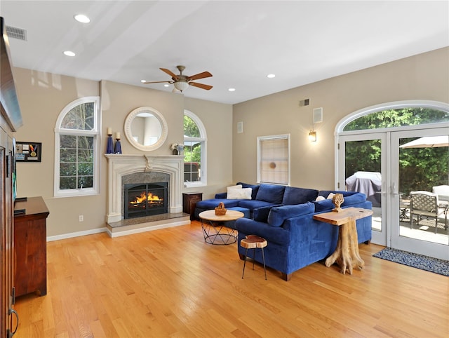26 Van Nostrand Pl, Nanuet, NY 10954 - living area with ceiling fan, light wood finished floors, a high end fireplace, and recessed lighting