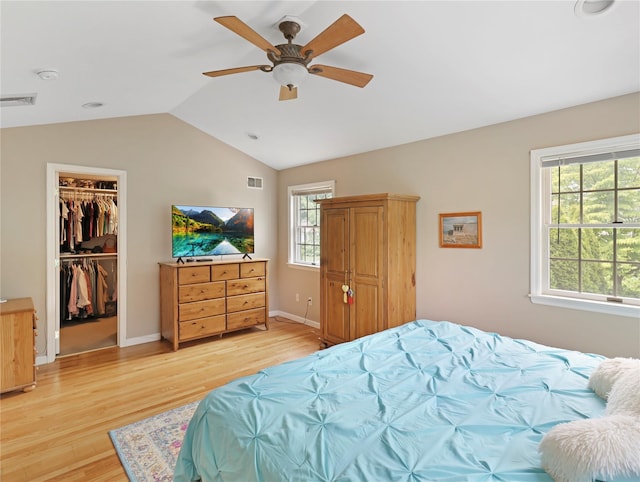 26 Van Nostrand Pl, Nanuet, NY 10954 - bedroom with light wood finished floors, lofted ceiling, a spacious closet, ceiling fan, and a closet