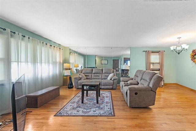 160 Laconia Ave, Staten Island, NY 10305 - living room featuring a chandelier and wood finished floors