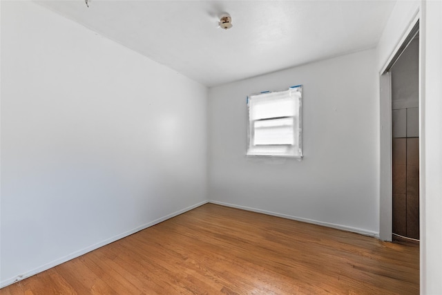 160 Laconia Ave, Staten Island, NY 10305 - unfurnished bedroom with light wood-style floors and baseboards