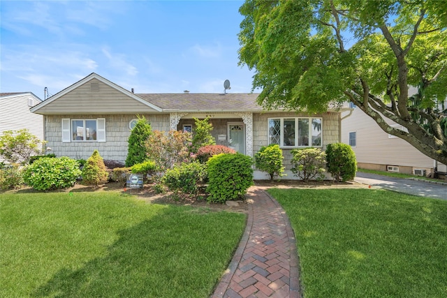 697 Byron Ave, Franklin Square, NY 11010 - ranch-style house featuring a front yard