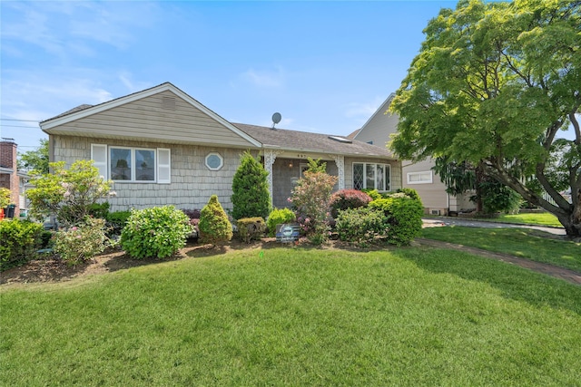 697 Byron Ave, Franklin Square, NY 11010 - ranch-style home with a front lawn