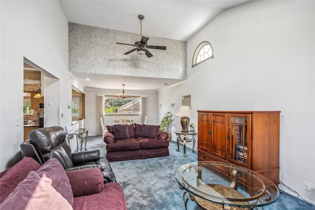 697 Byron Ave, Franklin Square, NY 11010 - living room featuring carpet floors, high vaulted ceiling, a chandelier, and a ceiling fan