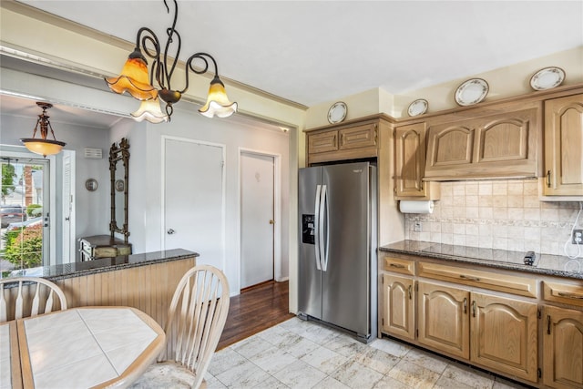 697 Byron Ave, Franklin Square, NY 11010 - kitchen featuring stainless steel fridge with ice dispenser, backsplash, black electric stovetop, dark stone counters, and pendant lighting
