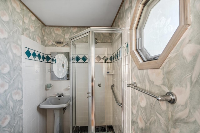 697 Byron Ave, Franklin Square, NY 11010 - bathroom featuring a stall shower and a skylight