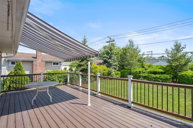 697 Byron Ave, Franklin Square, NY 11010 - wooden deck with a lawn