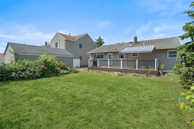 697 Byron Ave, Franklin Square, NY 11010 - rear view of property featuring a deck and a lawn