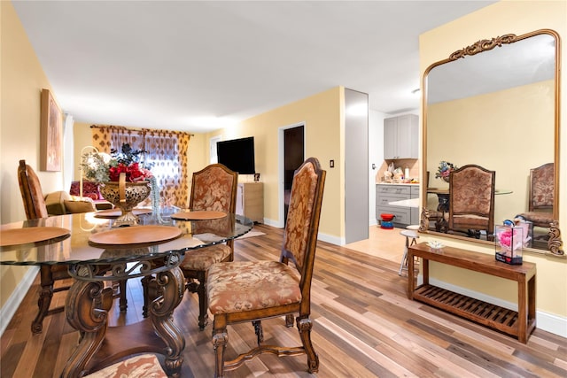 150 W End Ave Unit 1J, Brooklyn, NY 11235 - dining area featuring light wood finished floors and baseboards