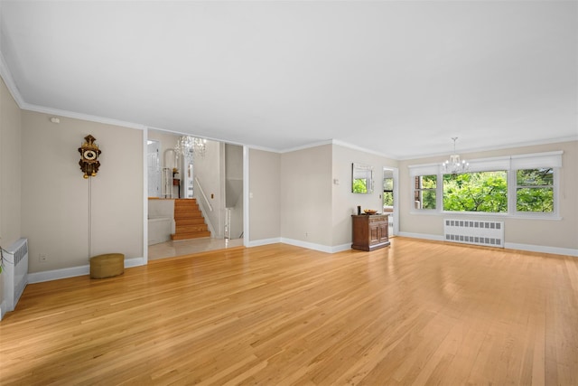 613 Gary Pl, Westbury, NY 11590 - unfurnished living room with a chandelier, radiator heating unit, stairs, light wood-style floors, and ornamental molding