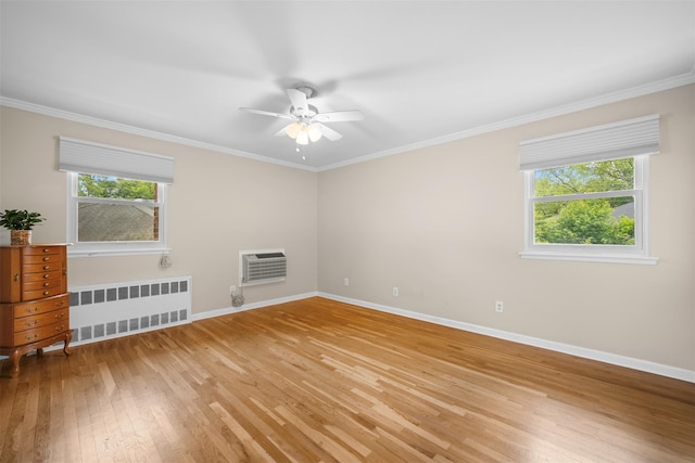 613 Gary Pl, Westbury, NY 11590 - unfurnished room featuring radiator heating unit, light wood finished floors, ceiling fan, baseboards, and ornamental molding