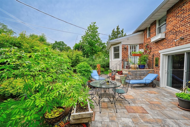 613 Gary Pl, Westbury, NY 11590 - view of patio / terrace with a wall mounted air conditioner