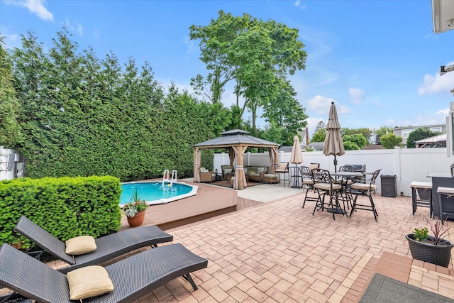 314 Oakview Ave, Oceanside, NY 11572 - view of patio / terrace with a gazebo, outdoor dining area, an outdoor pool, and a wooden deck