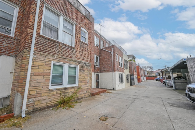 90-28 Pitkin Ave, Ozone Park, NY 11417 - view of concrete alley with a residential view